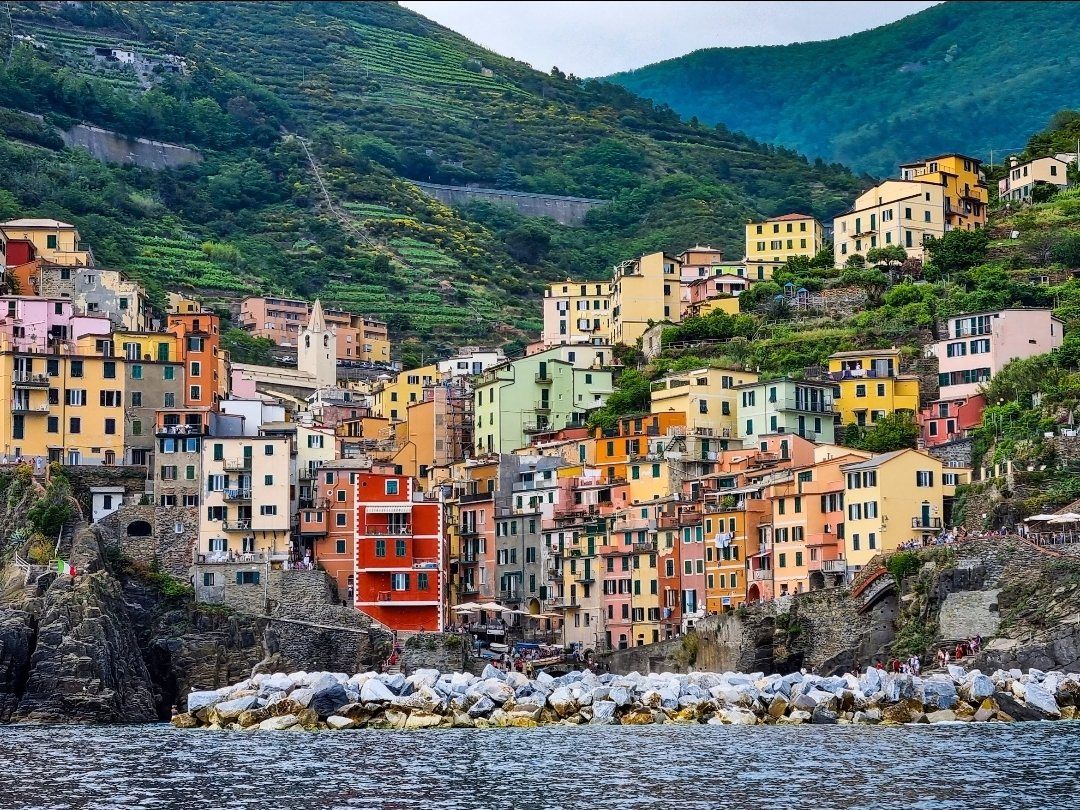 Colorful houses of Riomaggiore above the sea