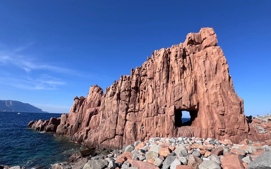 Arbatax: the Rocce Rosse, red rocks in turquoise water.