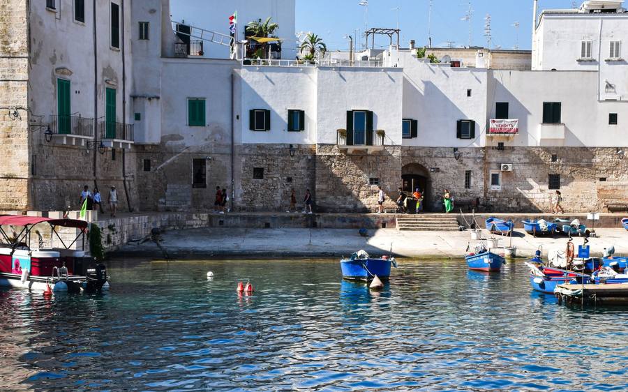 Monopoli: the old harbor with its blue fishing boats.