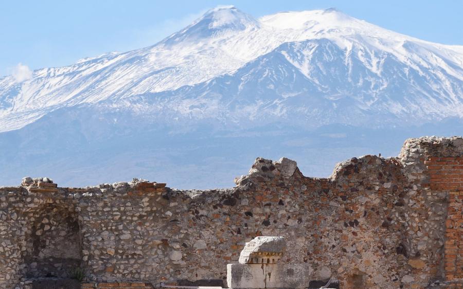 Taormina: the ruins of the Greek theater, with snow-capped Etna behind.