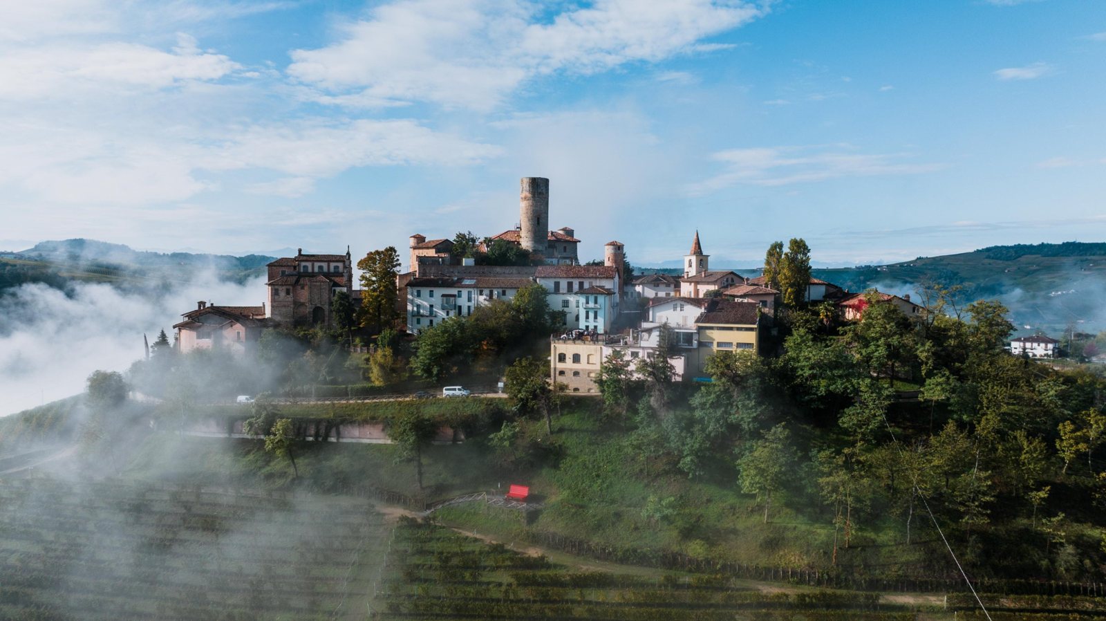 A Langhe hill village in morning mist