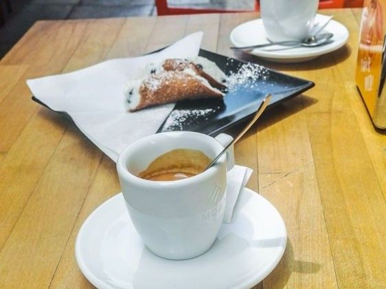Cannoli and espresso at a café in Palermo